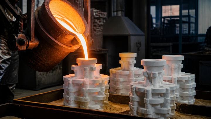 Ceramic shell building and controlled metal pouring